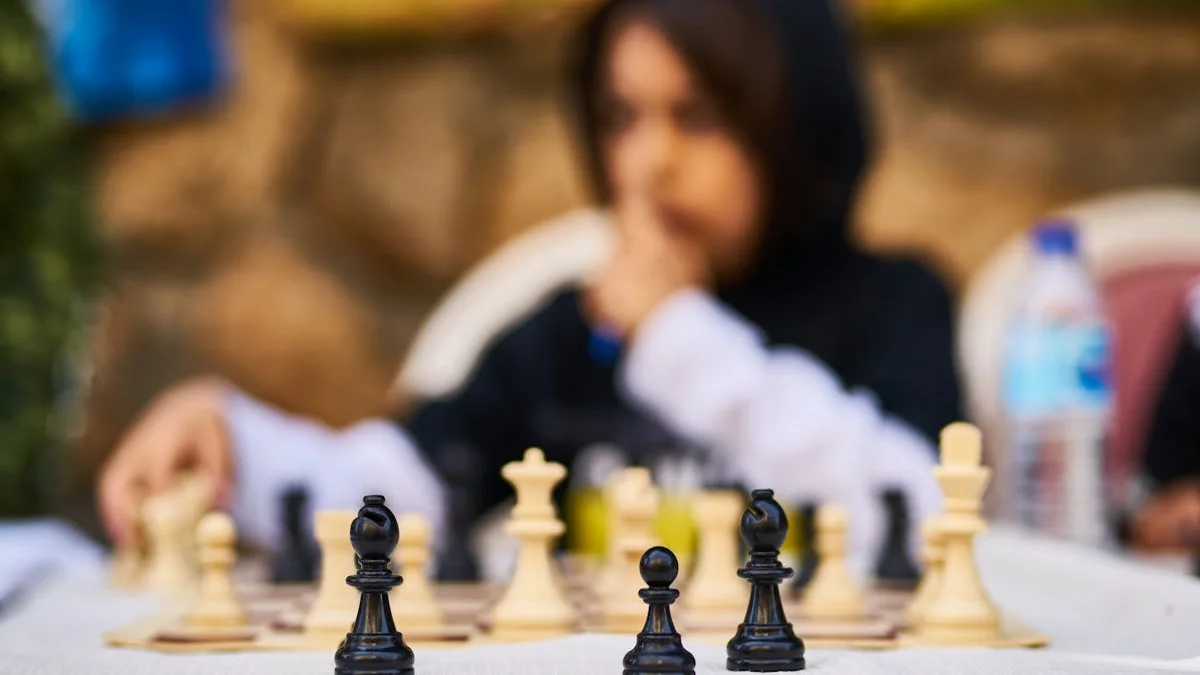 A child playing chess on a tablet during a long car ride