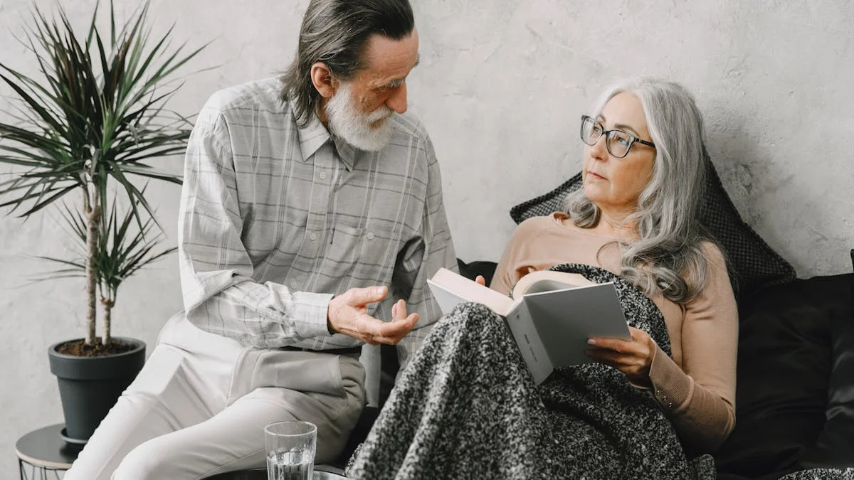 A senior couple sharing stories from a printed memoir